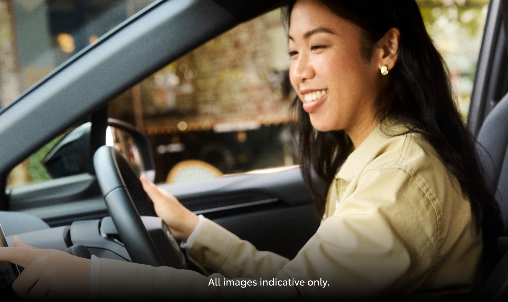 A woman driving a car