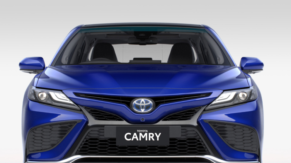 The front view of a blue Toyota Camry.