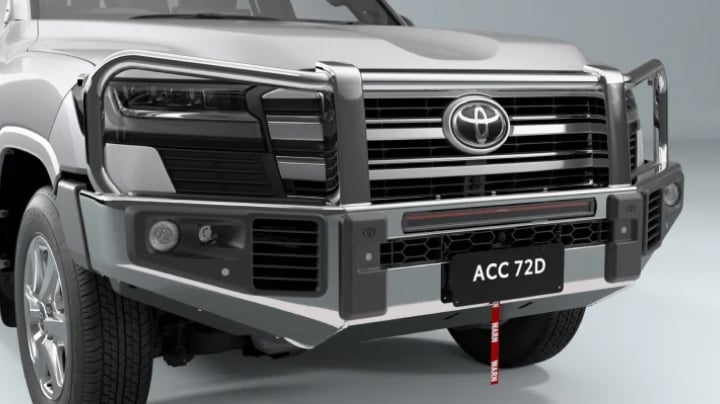 A grey LandCruiser 300 fitted with a Toyota Genuine Bull Bar.