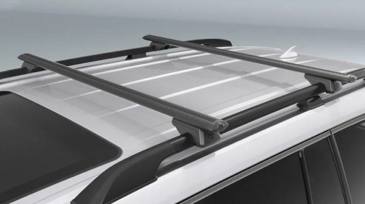 A grey LandCruiser 300 fitted with Toyota Genuine Roof Racks.