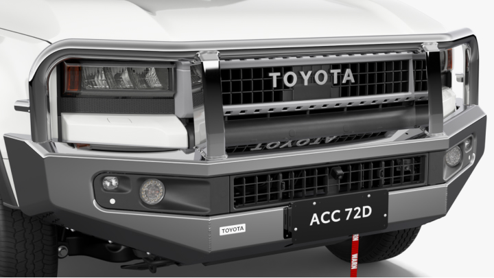 A white LandCruiser Prado fitted with a Toyota Genuine Bull Bar.