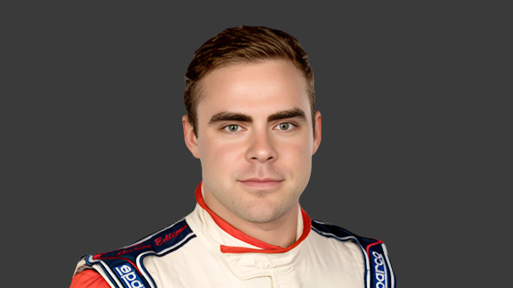 A headshot of professional T G R A driver Aaron Borg on a grey background.