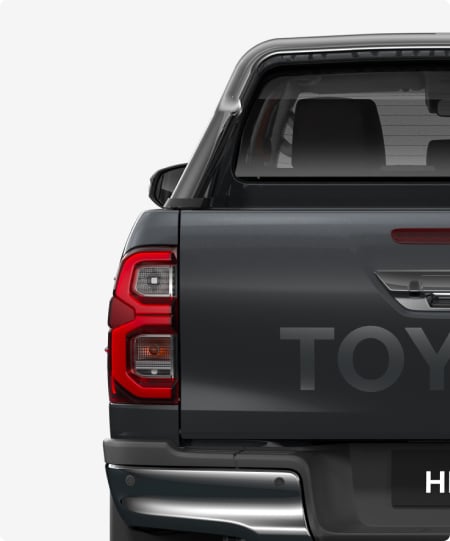 Rear view of a Graphite-coloured Toyota HiLux.