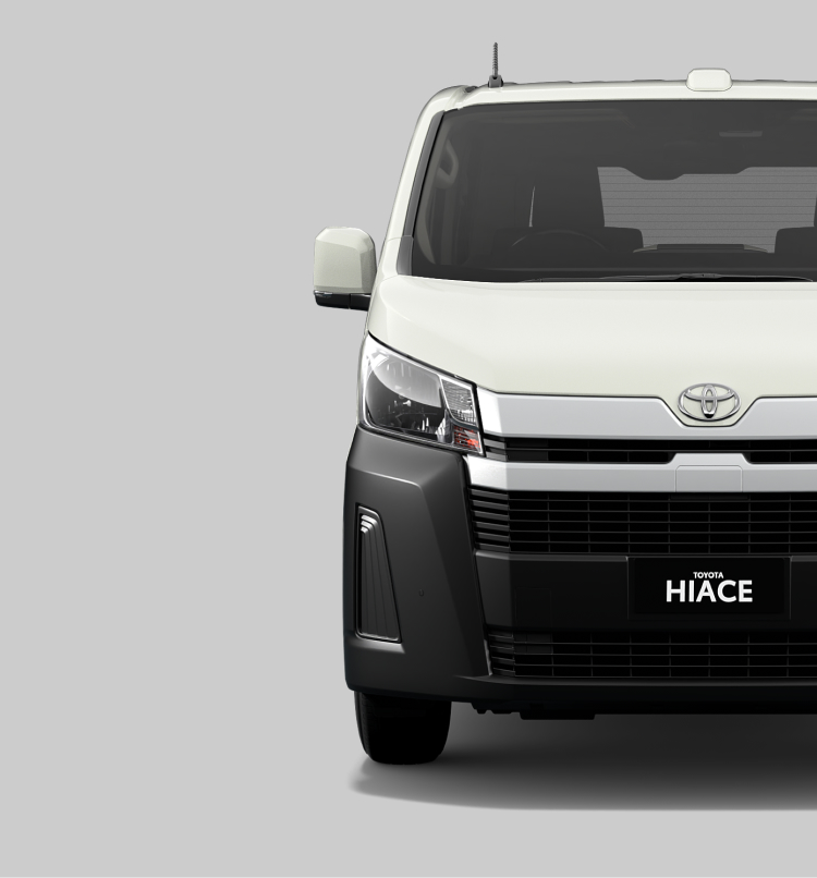 A front-facing white Toyota HiAce.