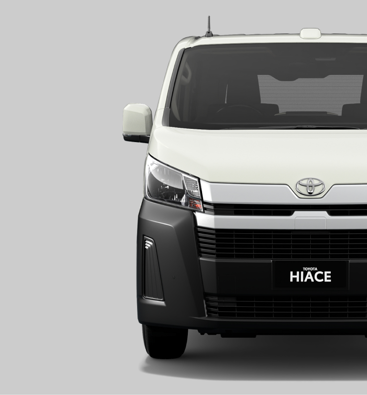 A front-facing grey white Toyota HiAce.