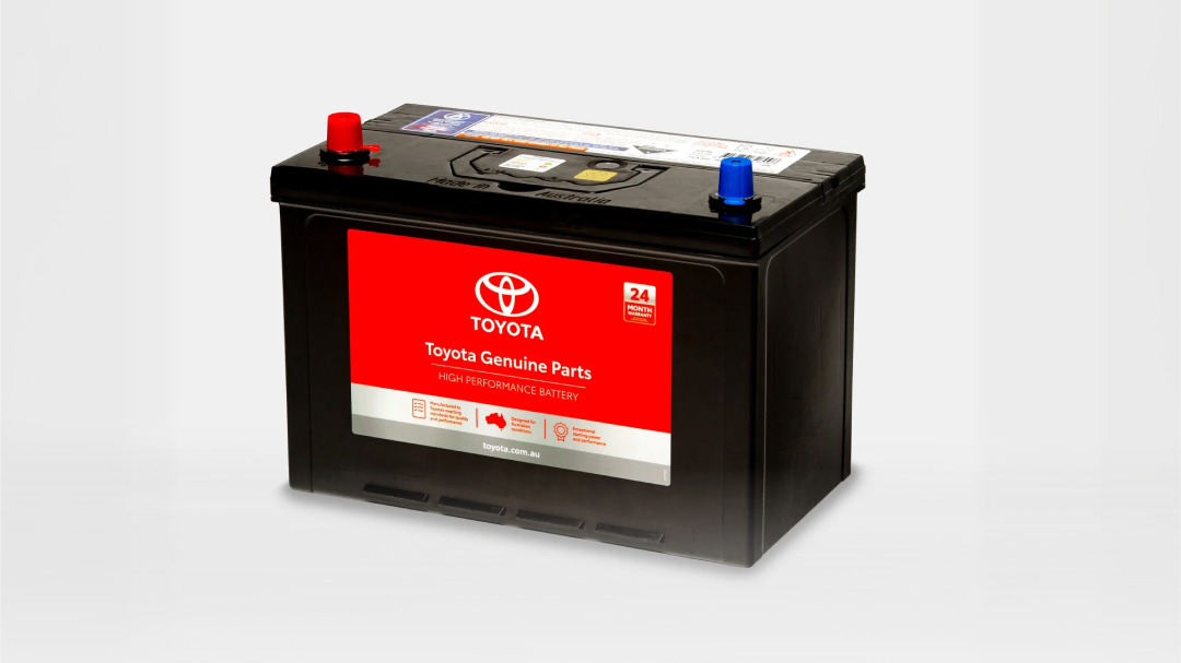 A black car battery with Toyota label.