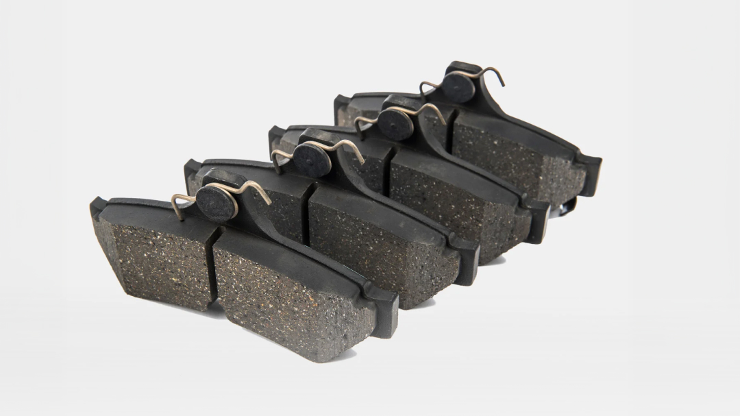 A set of black break pads.
