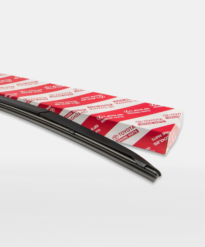 A black wiper blade next to its red and white Toyota packaging.