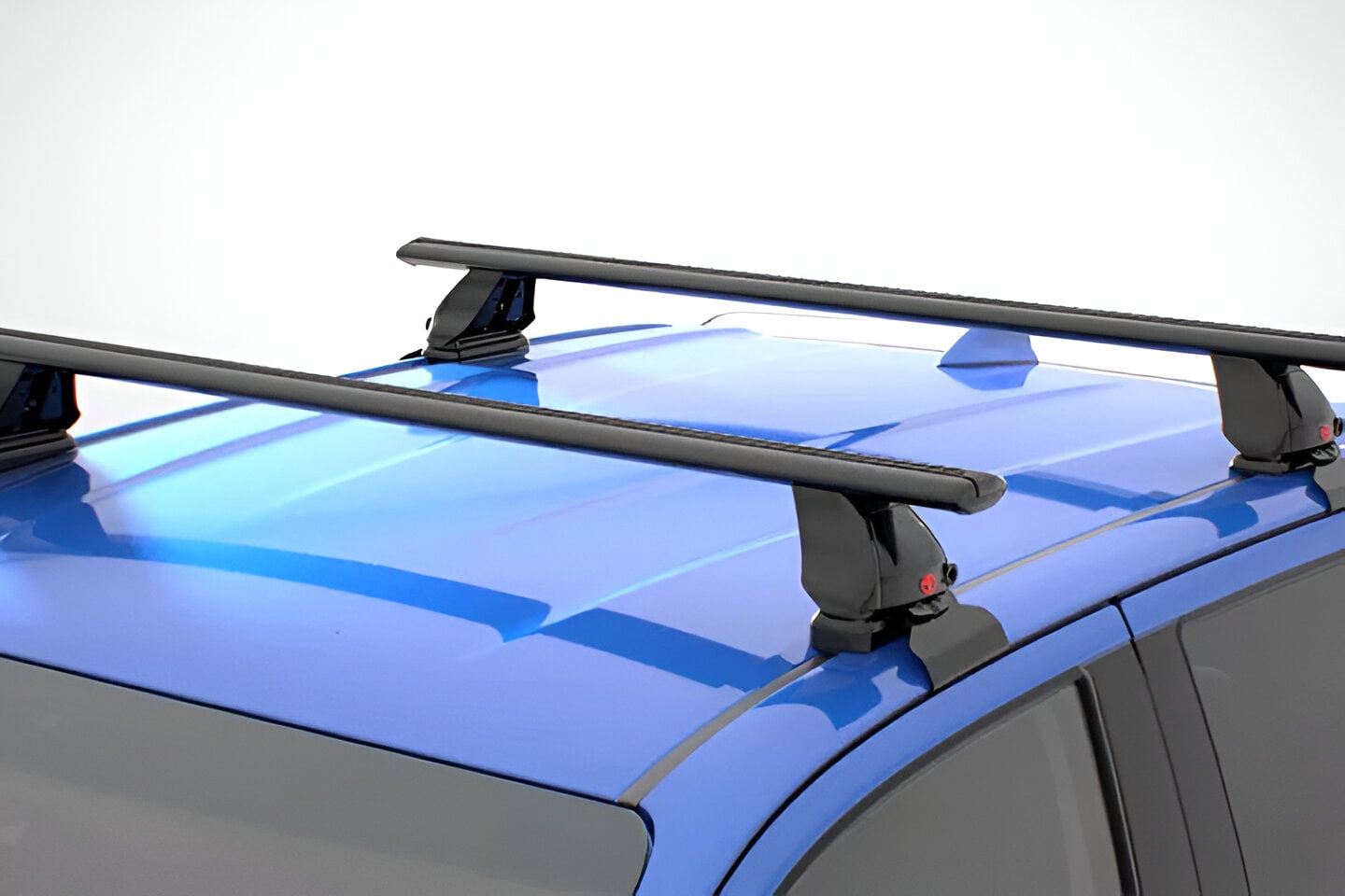 The roof of a blue Toyota Fortuner, fitted with a Toyota Genuine Roof Rack.