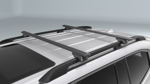The roof of a Toyota LandCruiser 300 fitted with Toyota Genuine Roof Racks.